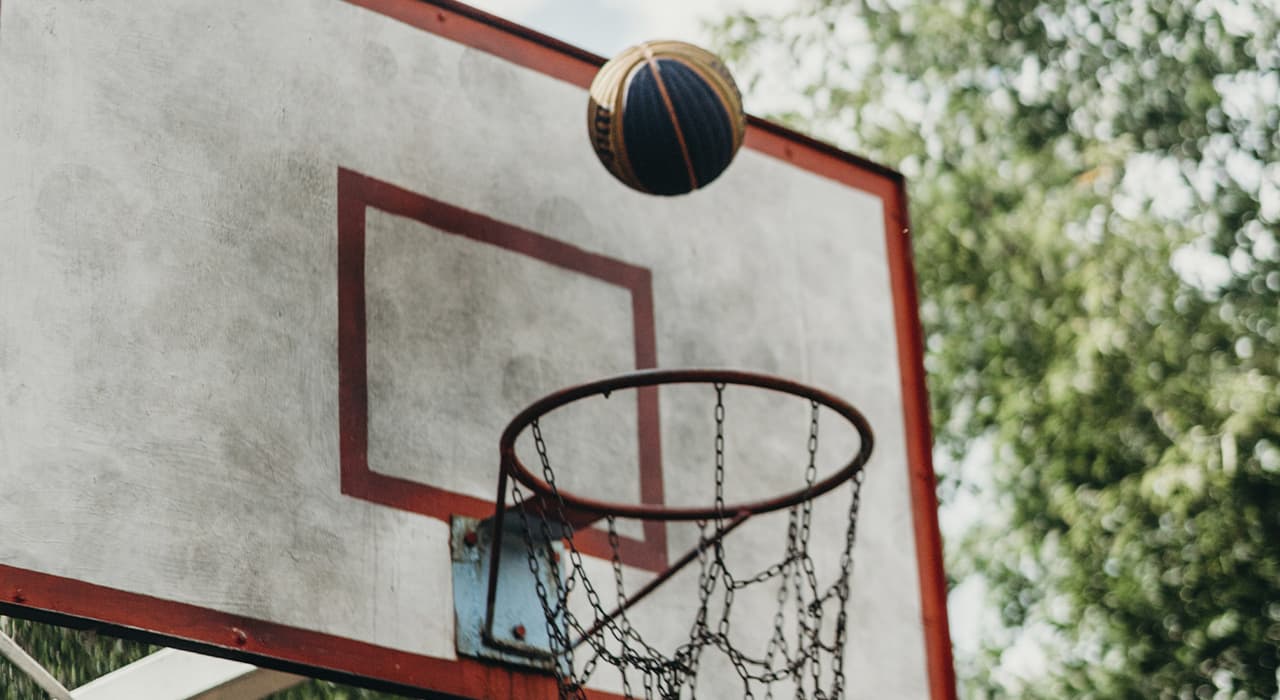 The ball over the basketball hoop